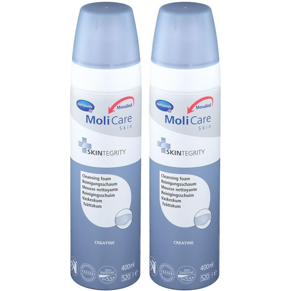 Deux flacons de mousse nettoyante MoliCare Skin. Flacons bleus avec texte blanc. Contient des informations sur SKINTEGRITY et la créatine.