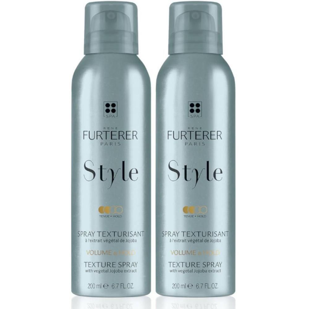 Twee sprays. Lichtgrijze flacons met verstuiver. Opschrift: FURTERER, Style, Spray Texturisant, Volume & Fixation.