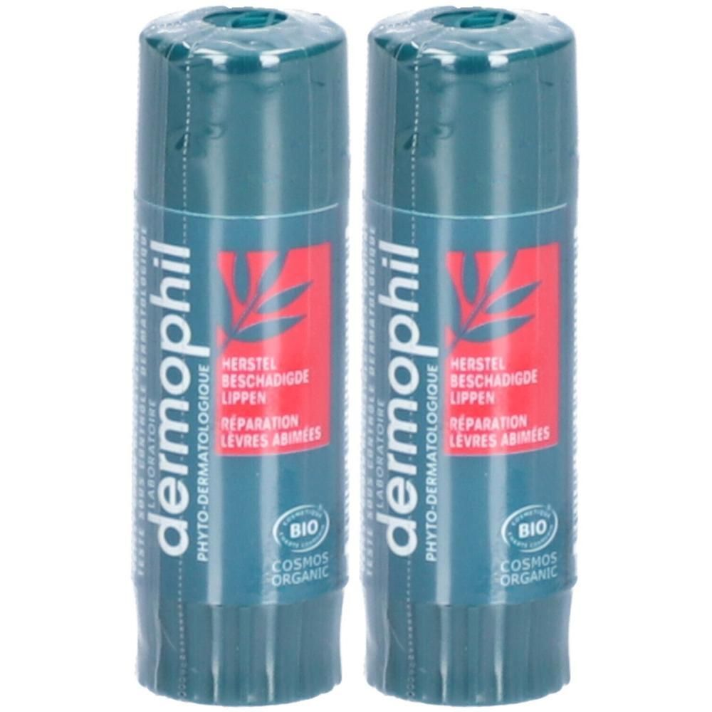 Deux sticks à lèvres verts. Inscription: Dermophil, Herstel beschadigde lippen, Réparation lèvres abîmées, Bio.