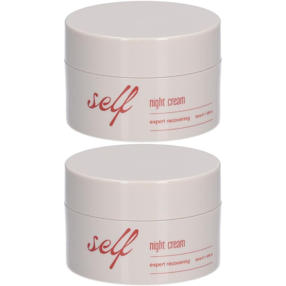 Deux pots crème avec couvercles. Inscription "self night cream expert recovering".