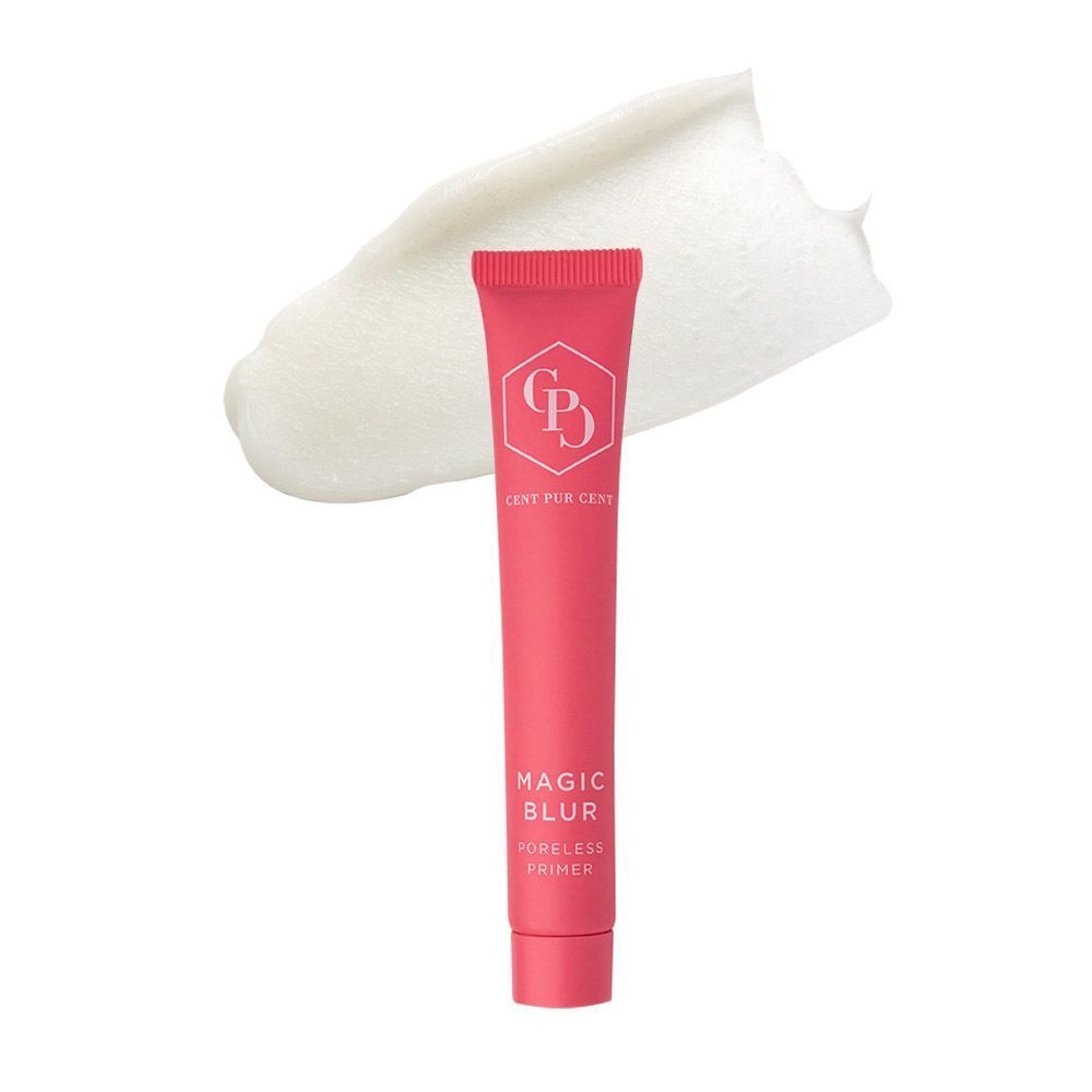 Tube rose avec logo et texte blancs, et une touche de produit blanc. Inscription : CENT PUR CENT, MAGIC BLUR.