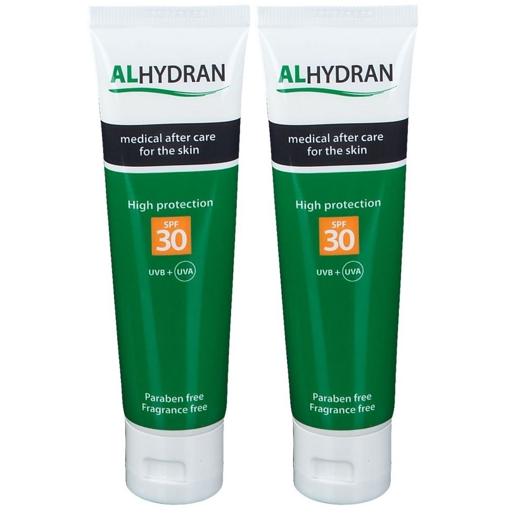 Twee tubes Alhydran Crème Solaire SPF30. Wit-groene verpakking. Tekst: medical after care for the skin, High protection, SPF 30, Paraben free, Fragrance free.