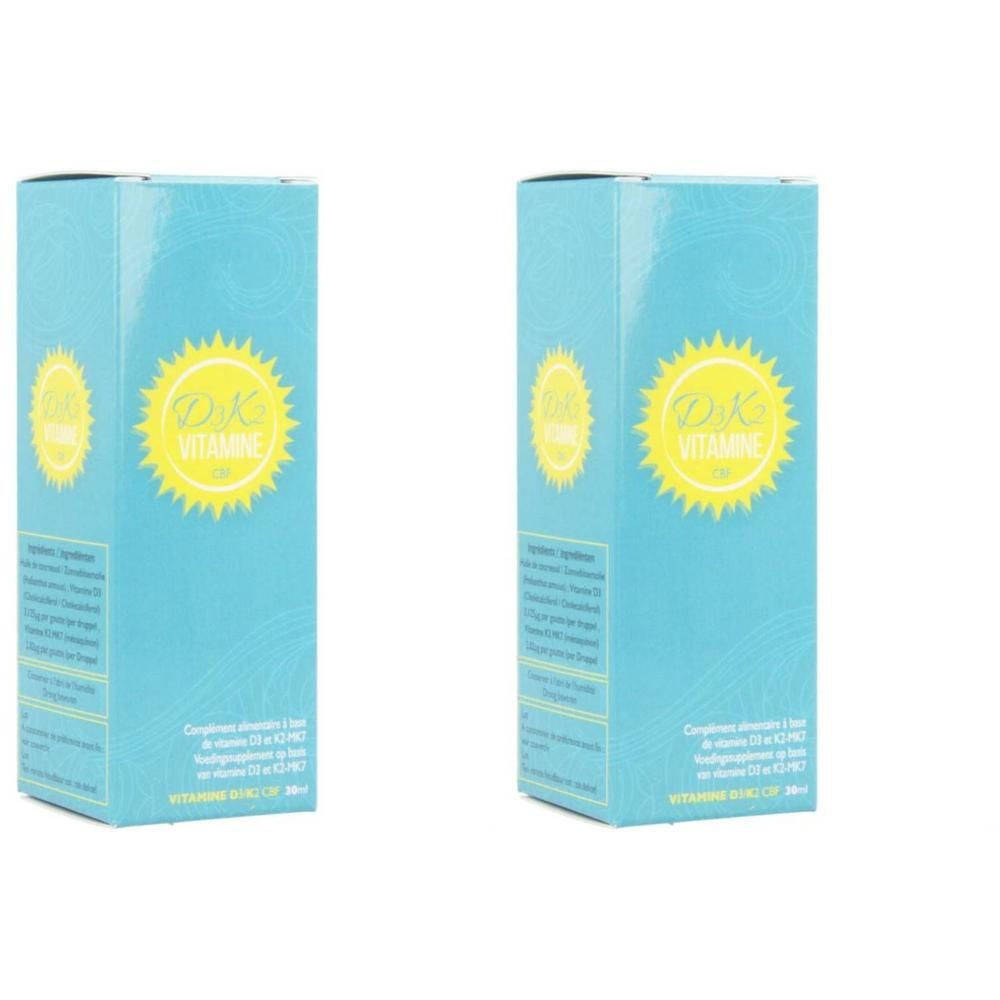 Twee blauwe dozen. Op elke doos staat een geel logo met de tekst "D K VITAMINE".