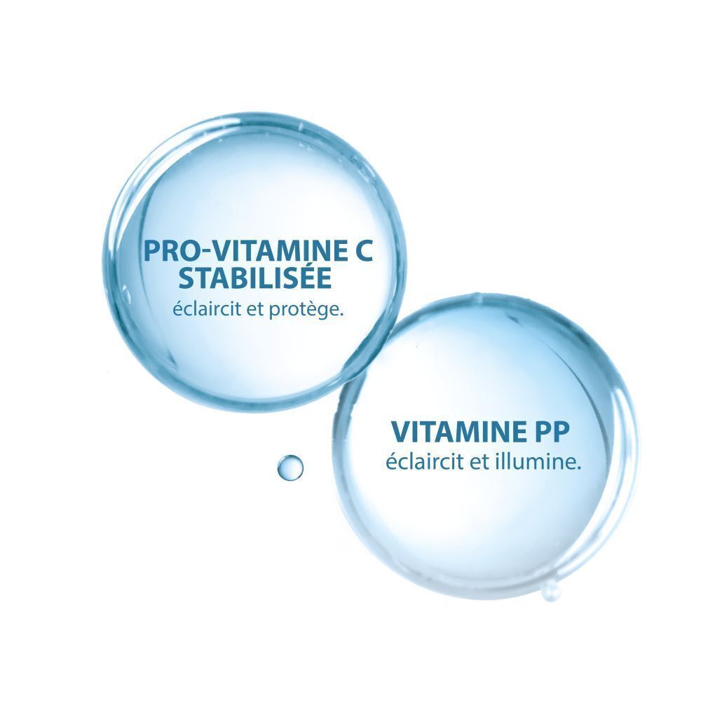 Deux cercles. Texte: Pro-Vitamine C stabilisée. Vitamine PP.