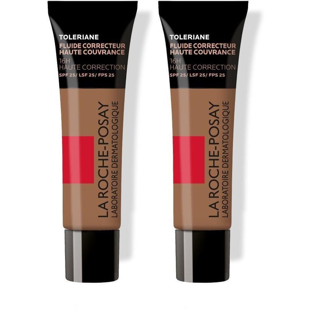 Twee tubes La Roche-Posay Toleriane Fluide Correcteur. Bruine vloeistof, zwarte dop, rode streep. Tekst: Haute Couvrance, SPF25.