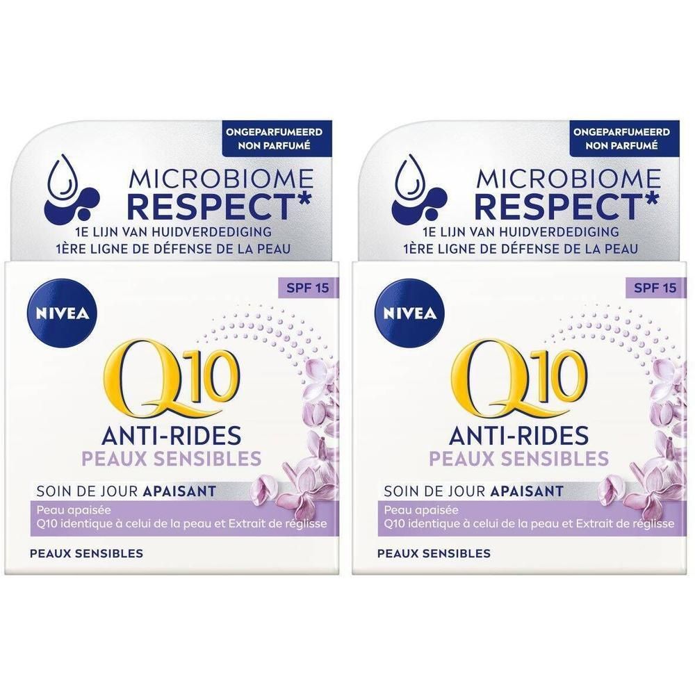 Twee vierkante verpakkingen. Opschrift: Nivea Q10 Anti-Rides Peaux Sensibles, SPF 15. Paarse bloemen en Microbiome Respect logo.