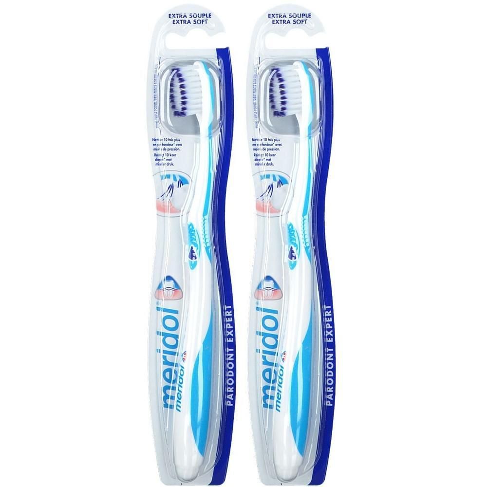 Deux brosses à dents dans un emballage. Manches blancs et bleus, soies bleues. Inscription : Meridol Parodont Expert, Extra Souple.