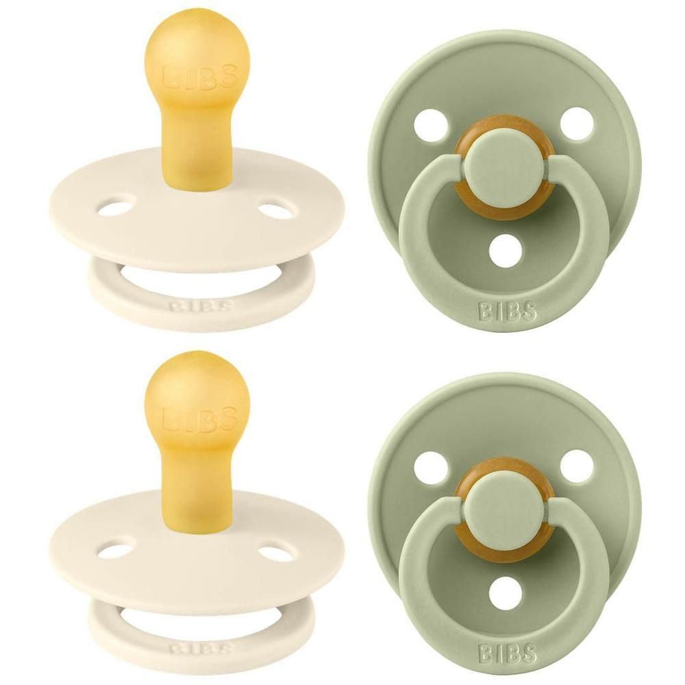 Twee spenen, ivoor en salie, met ronde speen en schild. BIBS-logo zichtbaar.