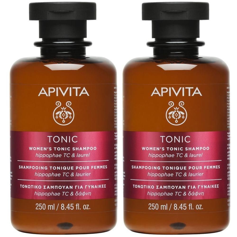 Deux flacons de shampooing Apivita Tonic pour femmes. Flacons bruns avec bouchon noir.