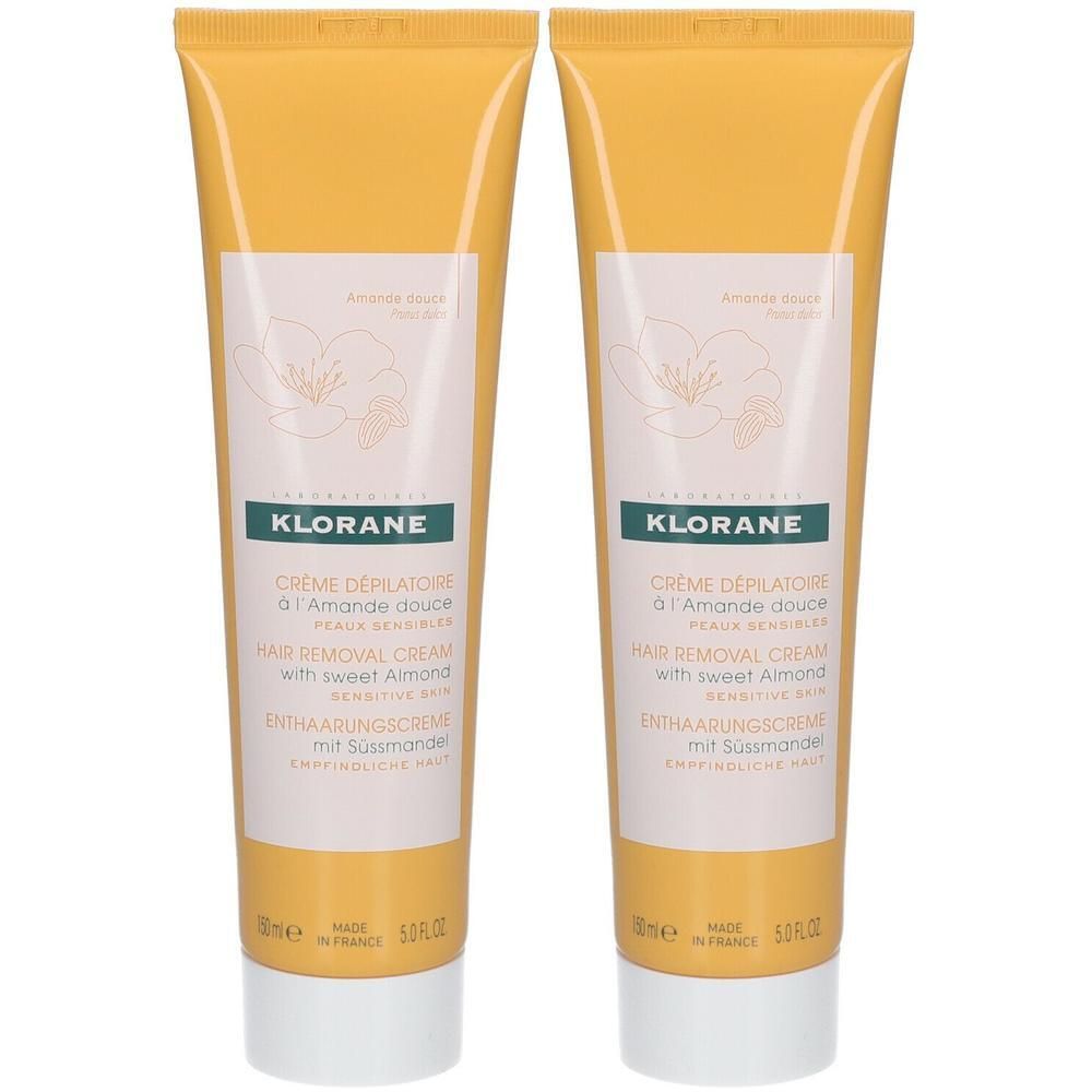 Twee tubes Klorane ontharingscrème. Gele tubes met witte opdruk. Tekst: Crème Dépilatoire, Hair Removal Cream, met zoete amandel.