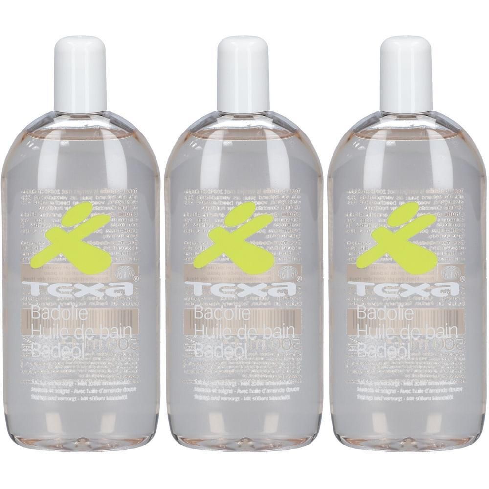 Drie transparante flessen met witte dop. Op het etiket staat TEXA, Badolie, Huile de bain, en een groen logo.