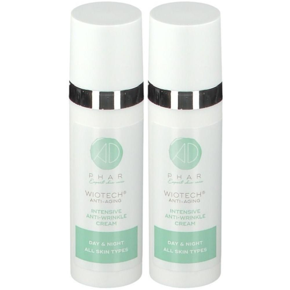 Deux tubes de crème blancs avec bande noire et argentée. Inscription: Wiotech Anti-Âge, Crème Anti-Rides Intensive. Jour & Nuit.