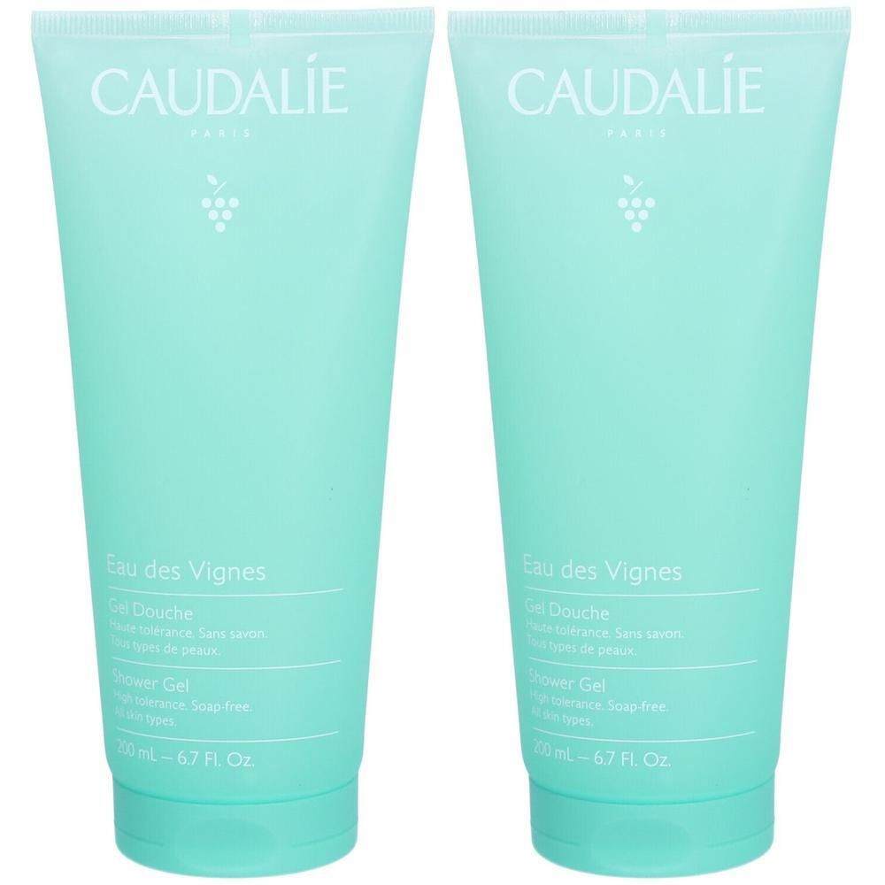 Twee turquoise tubes. Opschrift: CAUDALIE, Eau des Vignes, Gel Douche, 200 ml - 6.7 Fl. Oz. Druivenlogo. Zeepvrij.