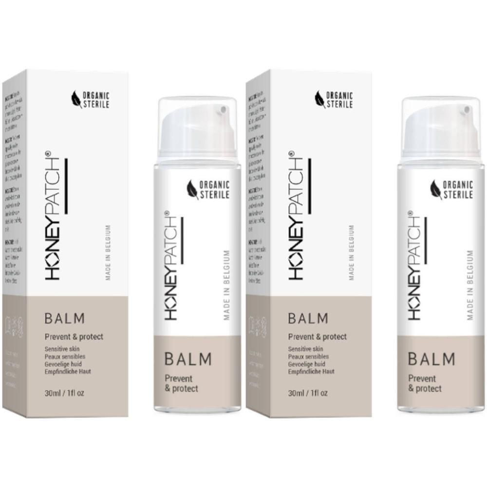 Drie flacons en verpakkingen van HONEYPATCH BALM. Opschrift: ORGANIC STERILE. Productnaam en beschrijving op de verpakkingen.