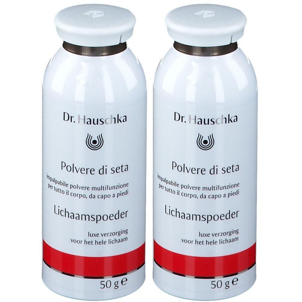 Deux flacons blancs avec couvercles. Inscription : Dr. Hauschka, Polvere di seta, Lichaamspoeder. Bande rouge. 50 g.
