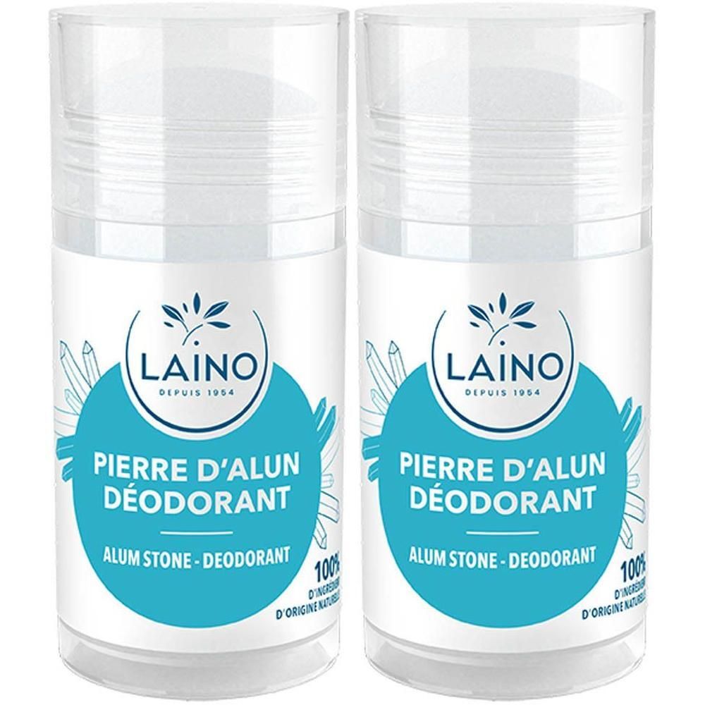 Twee deodorant roll-ons. Blauwe etiketten met witte tekst: LAINO, Pierre d'Alun Déodorant, Alum Stone. Transparante doppen.