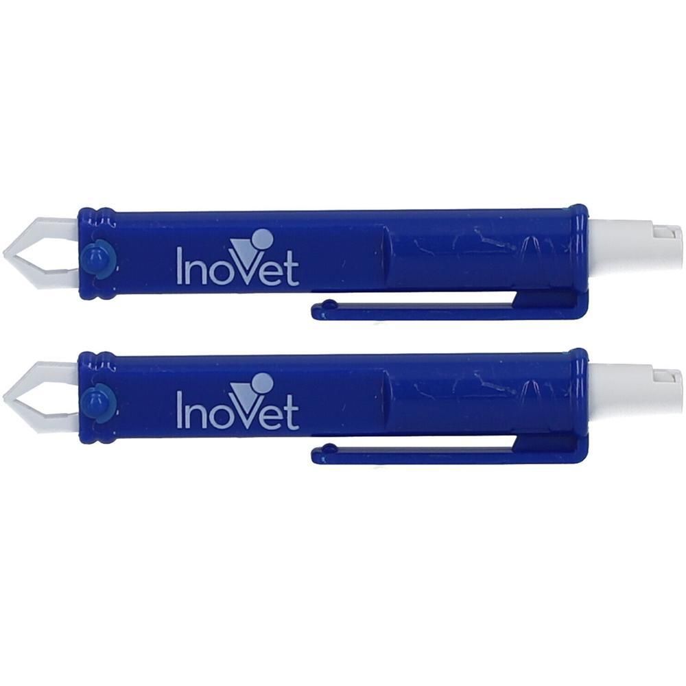 Deux pinces à tiques bleues avec partie de préhension blanche. InoVet.