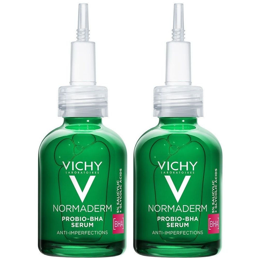 Deux flacons verts avec applicateur blanc. Inscription: Vichy Normaderm Probio-BHA Sérum. Anti-imperfections. BHA.