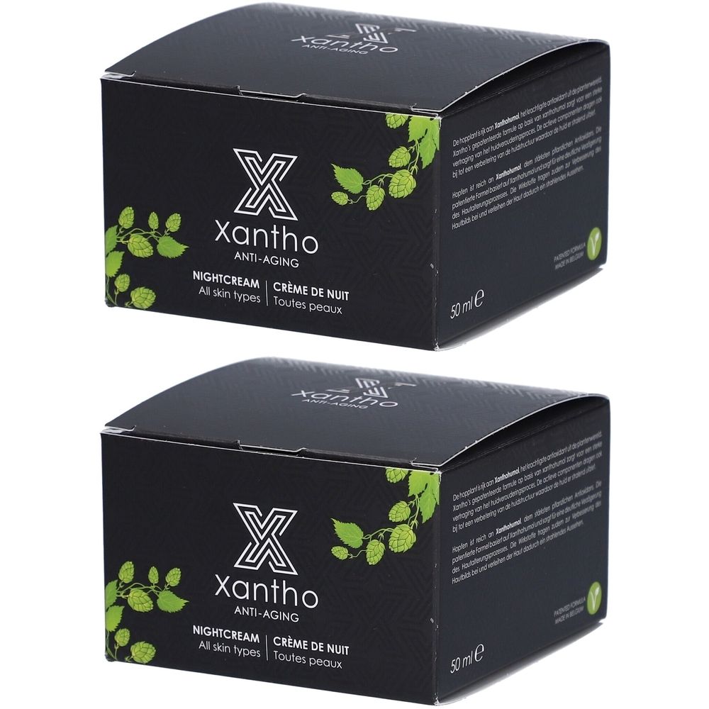 Deux boîtes noires de crème de nuit anti-âge Xantho. Texte: NIGHTCREAM CRÈME DE NUIT, tous types de peau. Logo: X.