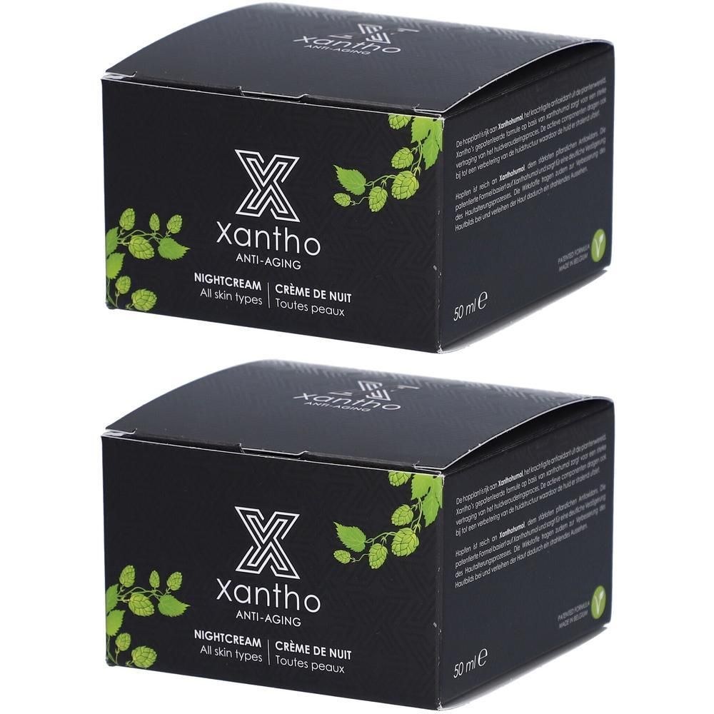 Deux boîtes noires avec logo Xantho et inscription "Anti-Âge". Inscription "Nightcream".