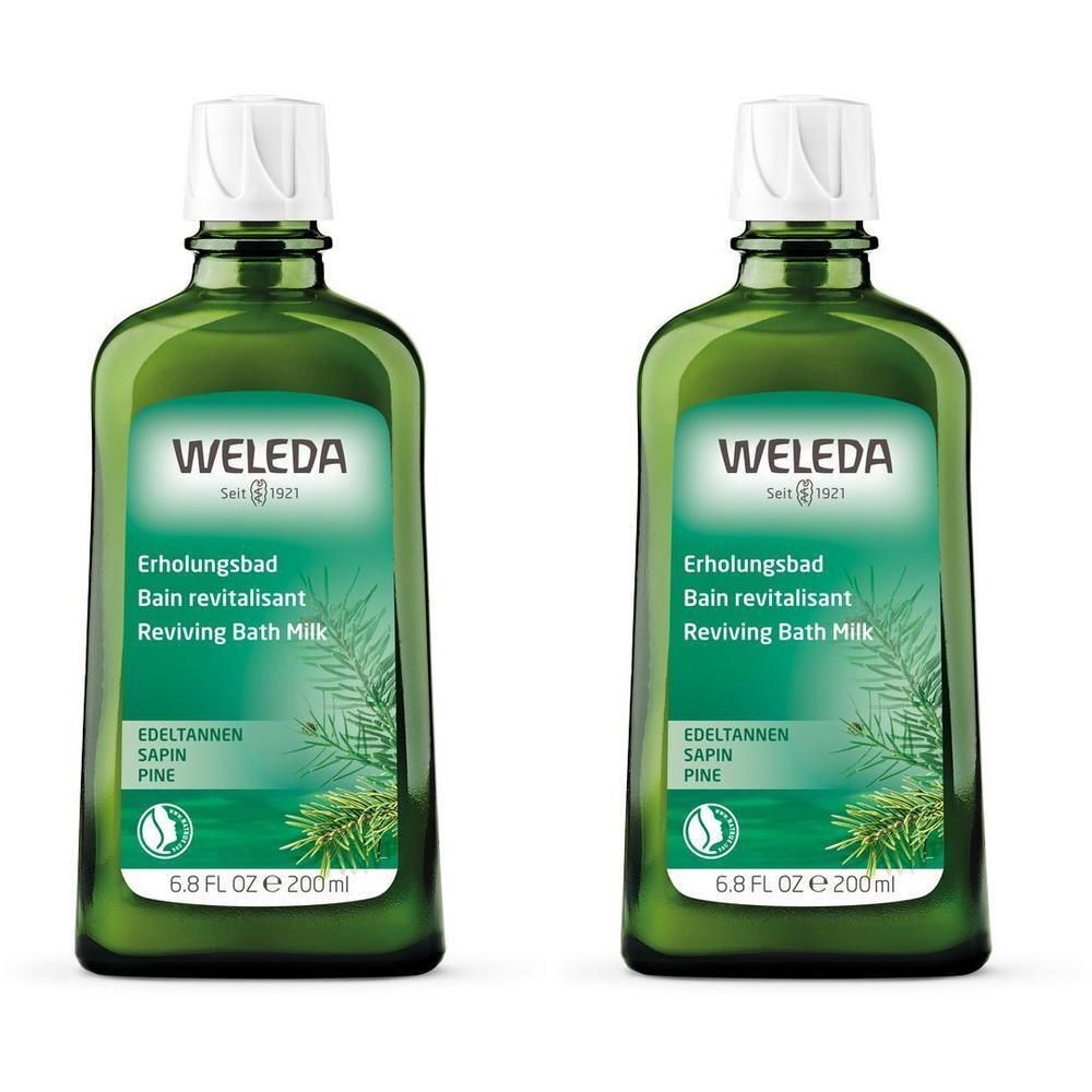 Deux flacons verts avec bouchons blancs. Étiquettes avec "WELEDA", "Erholungsbad", "Bain revitalisant", et "Reviving Bath Milk".