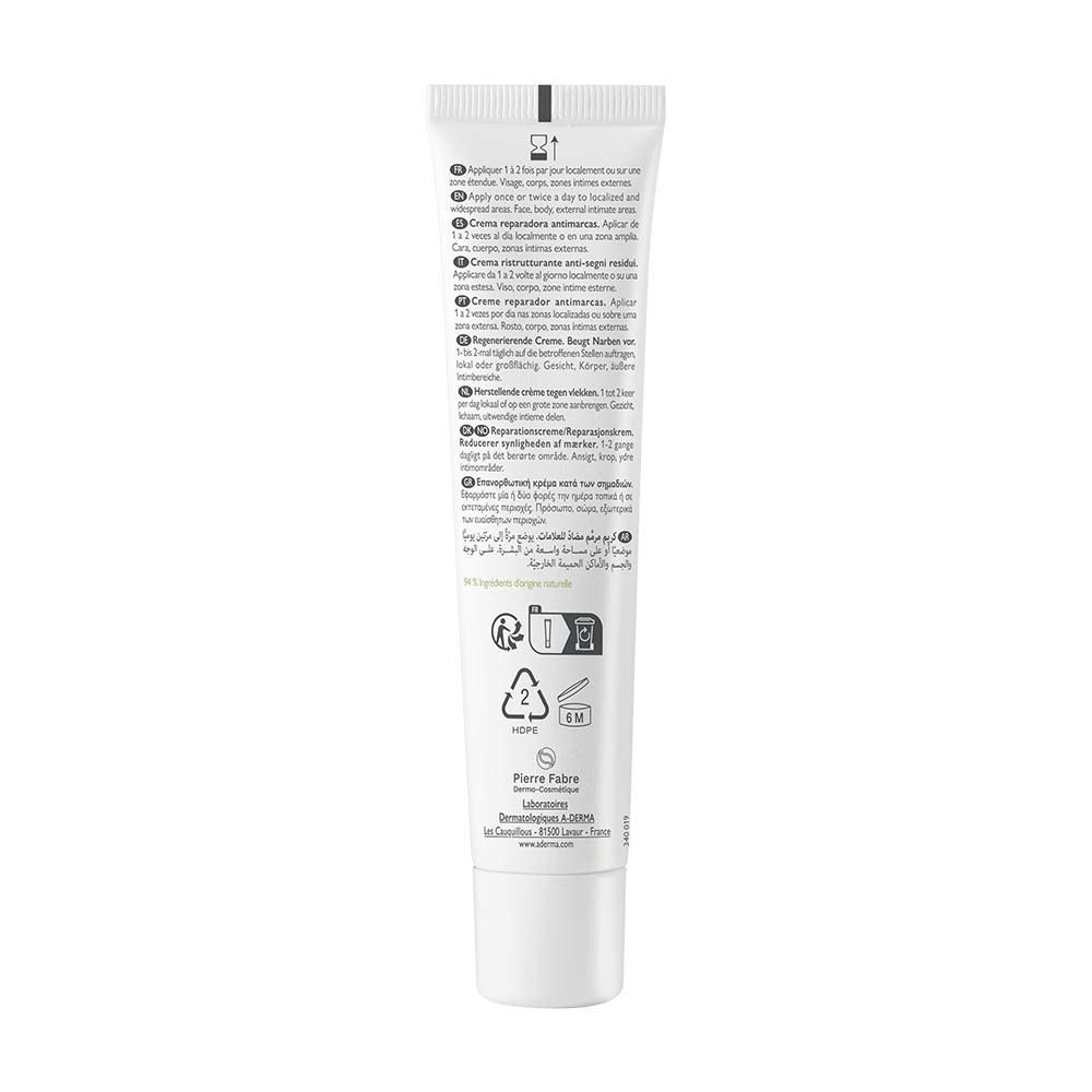 Tube blanc avec inscription noire, contenant des instructions et des ingrédients en plusieurs langues.