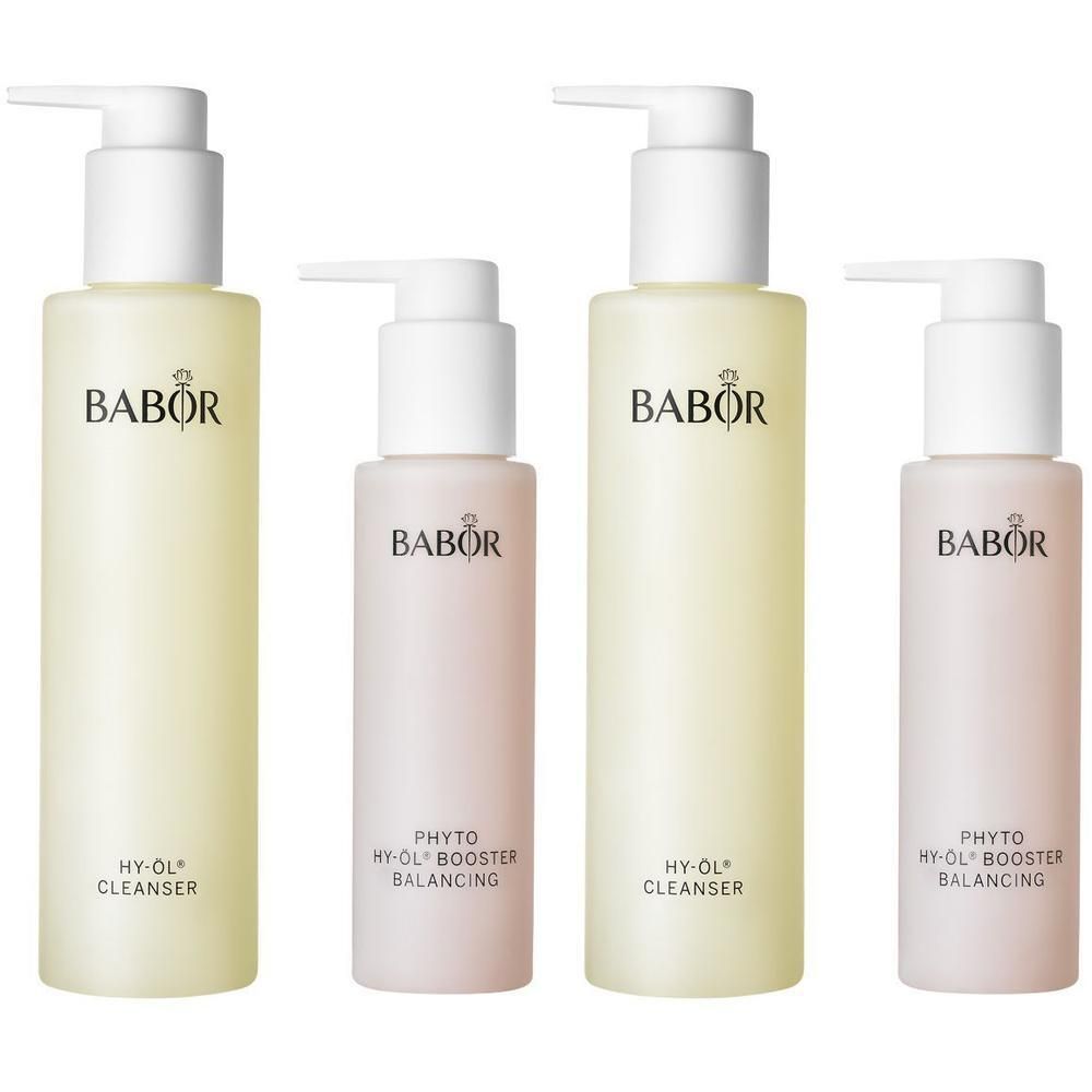 Vier flessen met pomp. Twee gele en twee roze. Opschrift BABOR en HY-ÖL CLEANSER.
