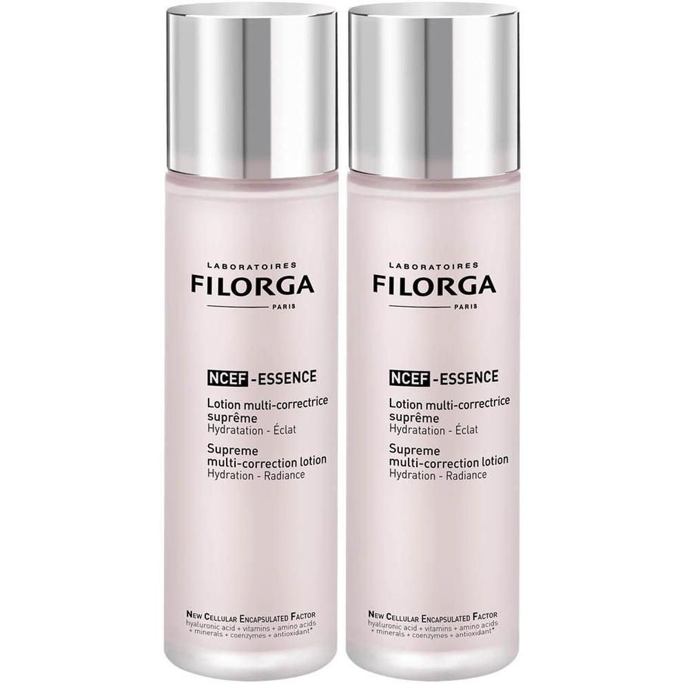 Twee flessen met zilveren doppen. Op elke fles staat "FILORGA" en "NCEF-ESSENCE Lotion multi-correctrice suprême". 