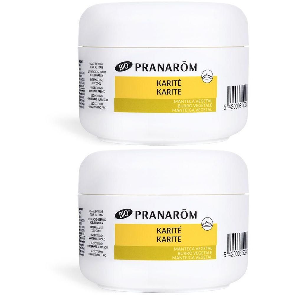Deux pots blancs avec étiquettes jaunes. Inscription: Pranarôm Karité Karité. Label BIO.