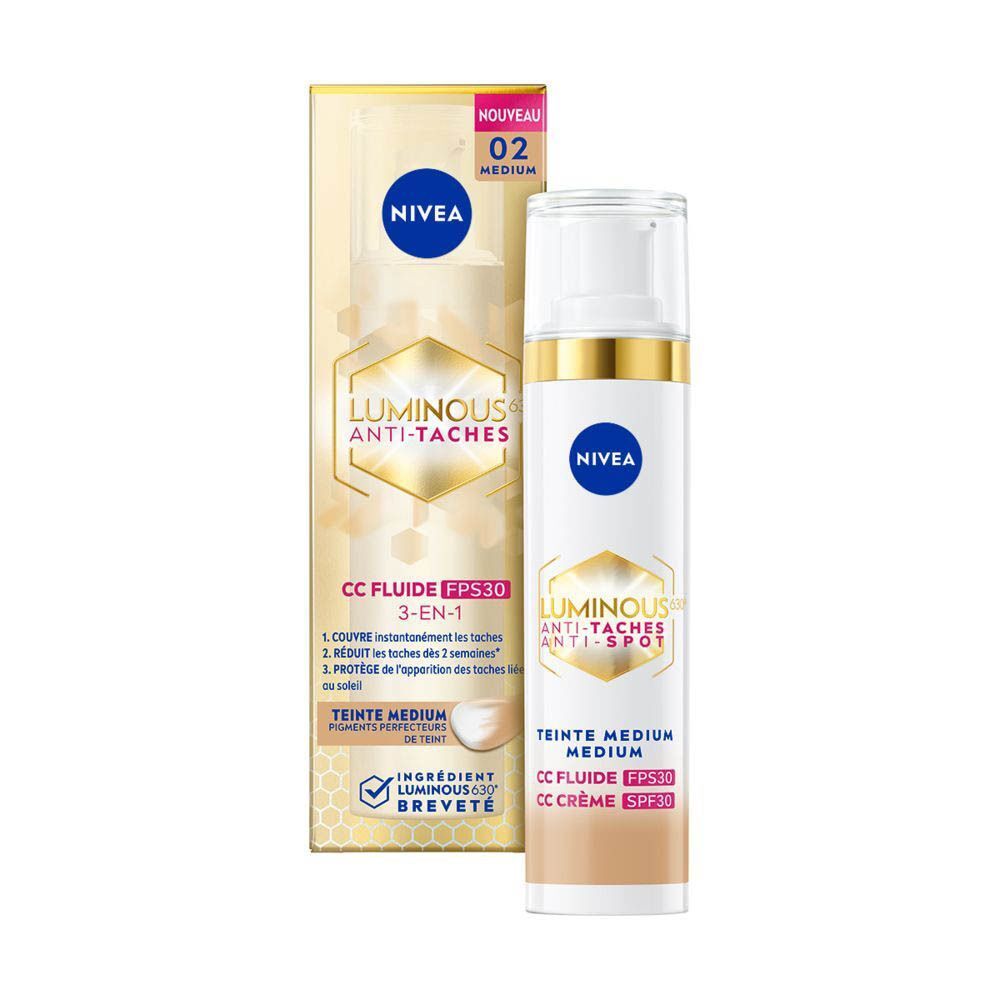 Nivea Cellular Luminous 630 CC Fluid Cream SPF30 Medium avec emballage. Flacon blanc, détails dorés, logos bleus, emballage jaune.