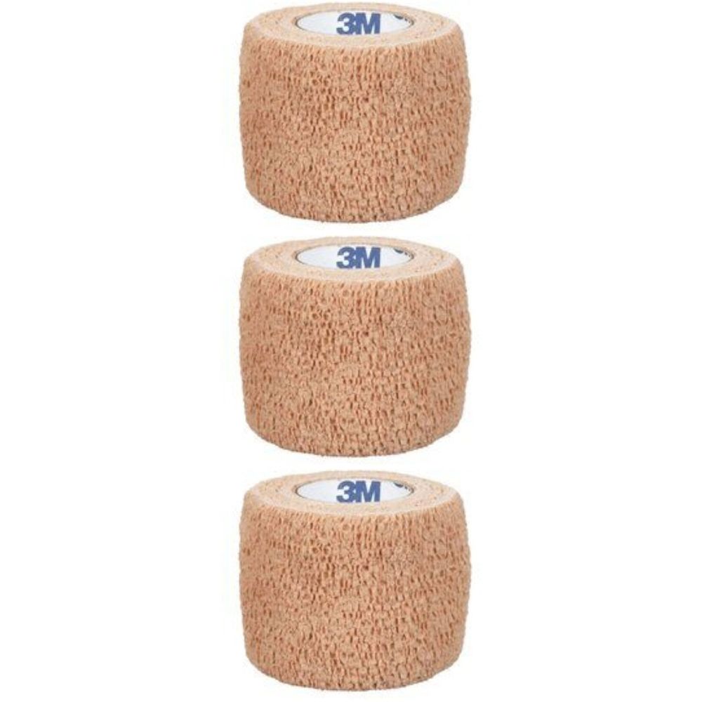 Trois rouleaux de bandage beige. Le logo 3M est visible sur chaque rouleau.