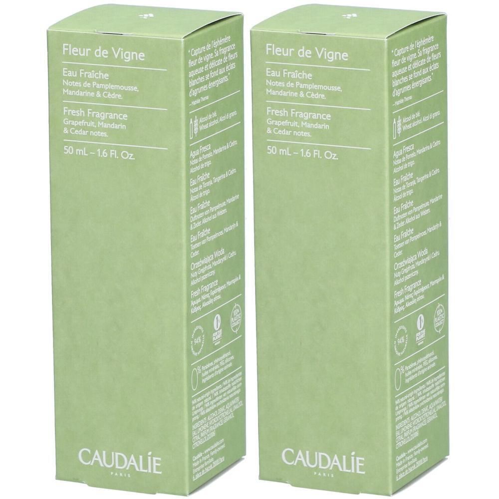 Twee groene dozen. Opschrift: Fleur de Vigne, Eau Fraîche, Fresh Fragrance. Merk: Caudalie.