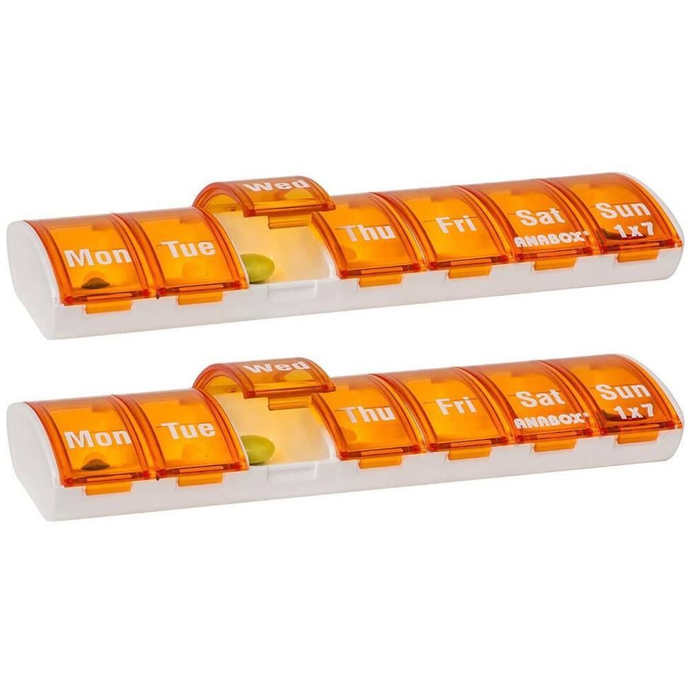 Deux piluliers oranges avec sept compartiments pour les jours de la semaine. Inscriptions : Lun, Mar, Mer, Jeu, Ven, Sam, Dim. Marque : ANABOX.