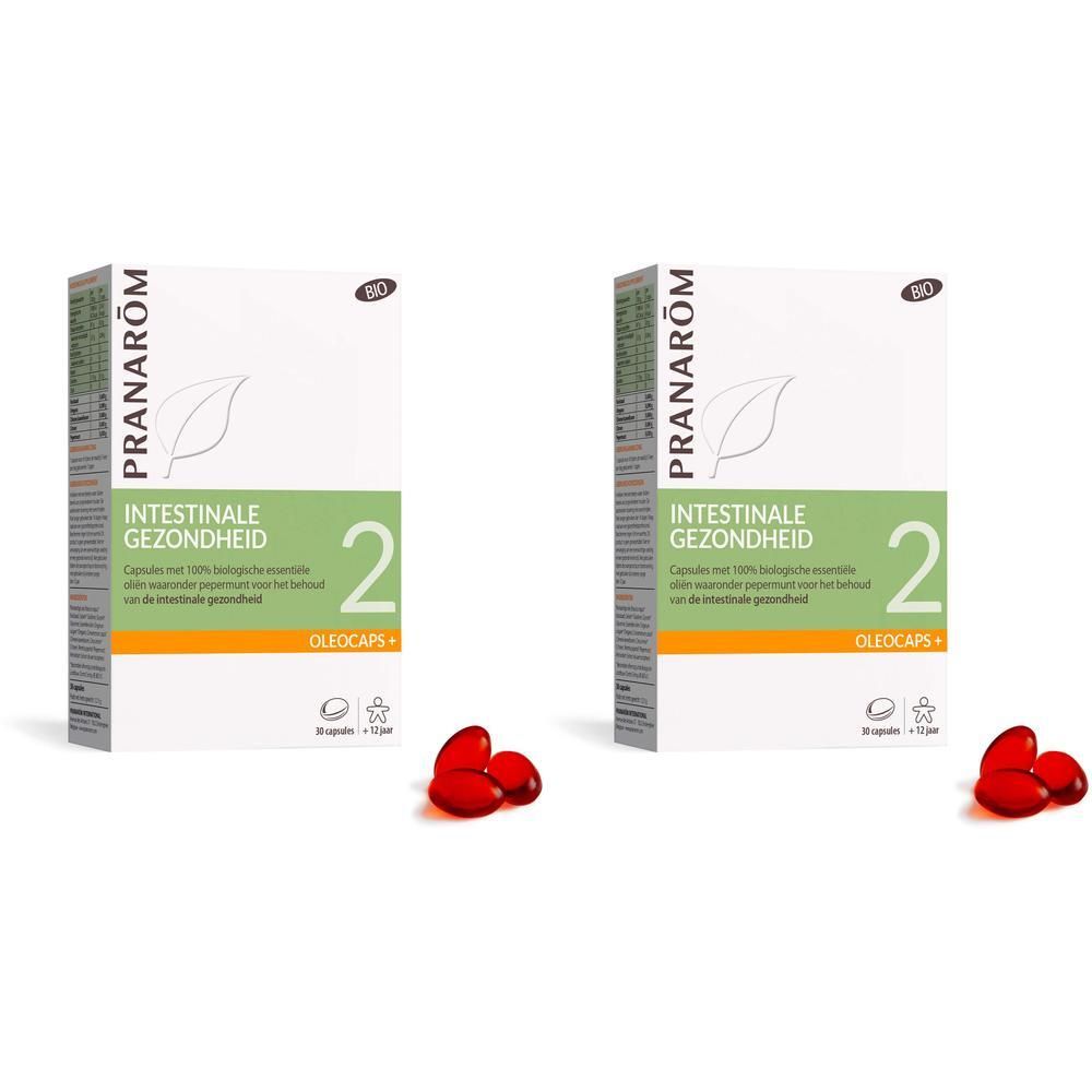 Twee dozen met "Intestinale Gezondheid 2 Oleocaps+". Rode capsules ernaast.