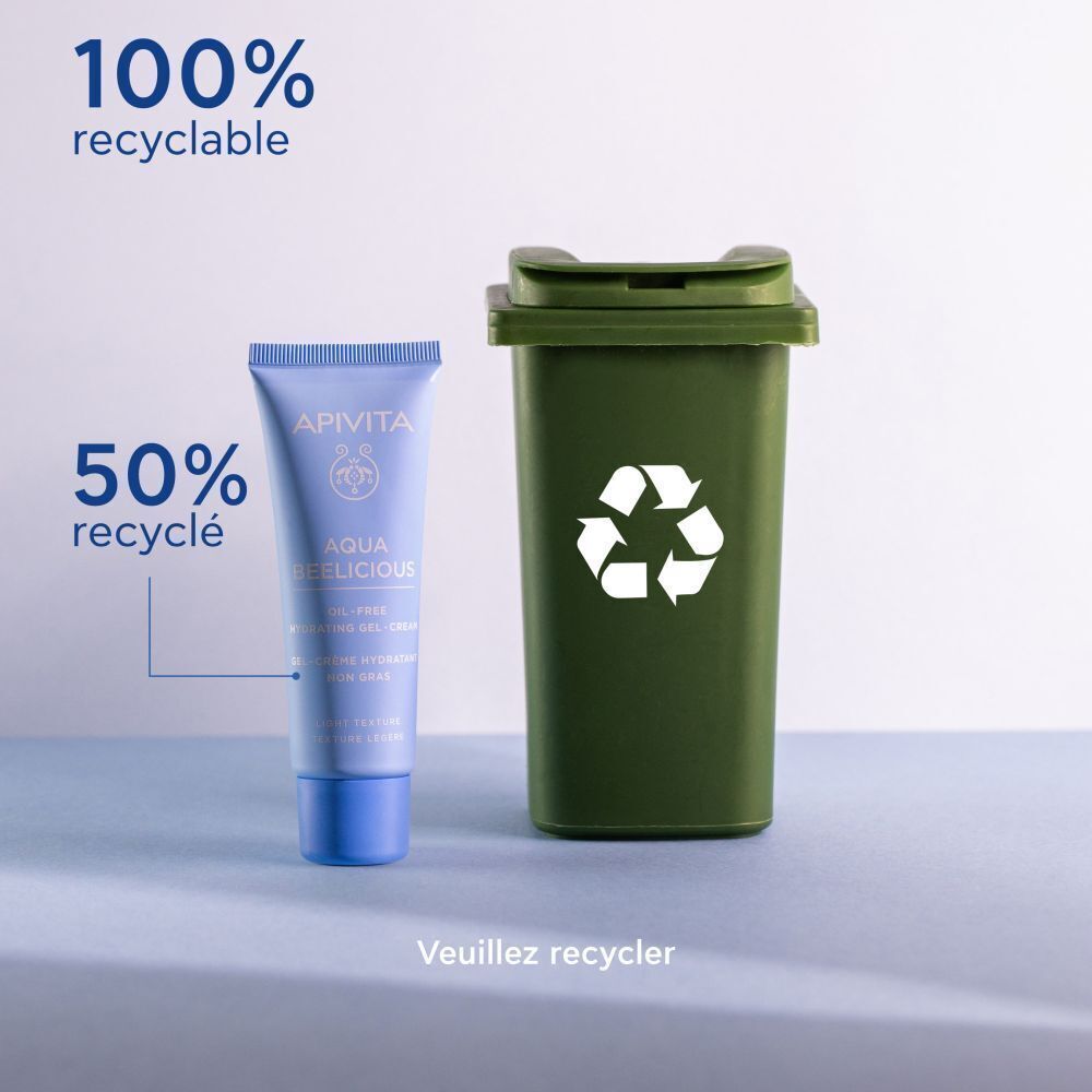 Tube à côté d'une poubelle. Inscription : Apivita, Aqua Beelicious, Gel-crème hydratant non gras. 100% recyclable.