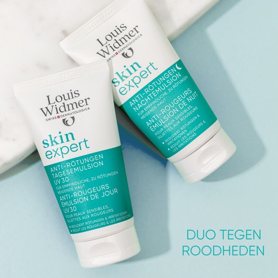 Twee tubes Louis Widmer Skin Expert. Een Anti-Rougeurs dagemulsie UV 30, een Anti-Rougeurs nachtemulsie. Tekst: DUO TEGEN ROODHEDEN.