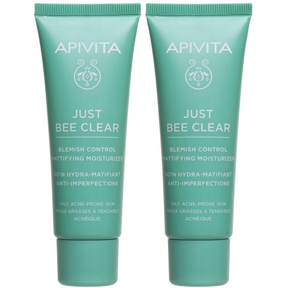 Twee groene tubes. Opschrift: Apivita, Just Bee Clear, Blemish Control, matterende moisturizer.