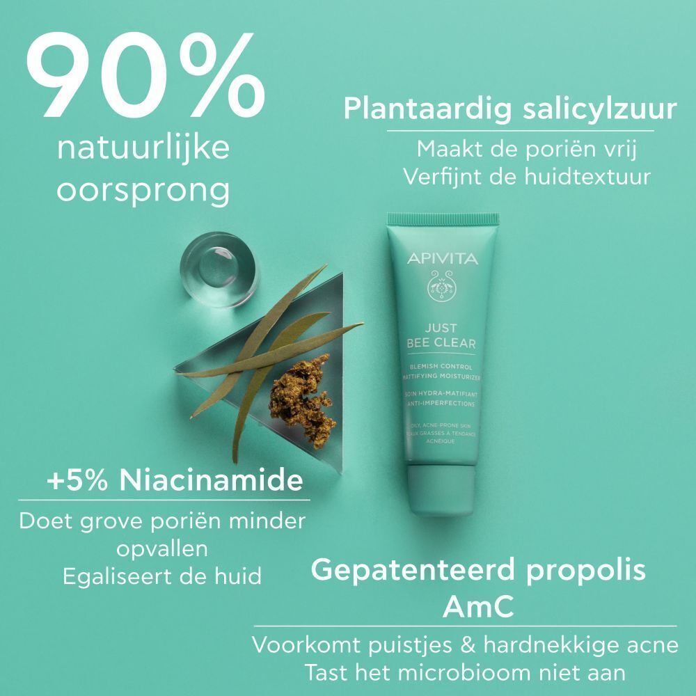 Tube met ingrediënten. Tekst: 90% natuurlijke oorsprong, +5% Niacinamide, gepatenteerde propolis AmC.