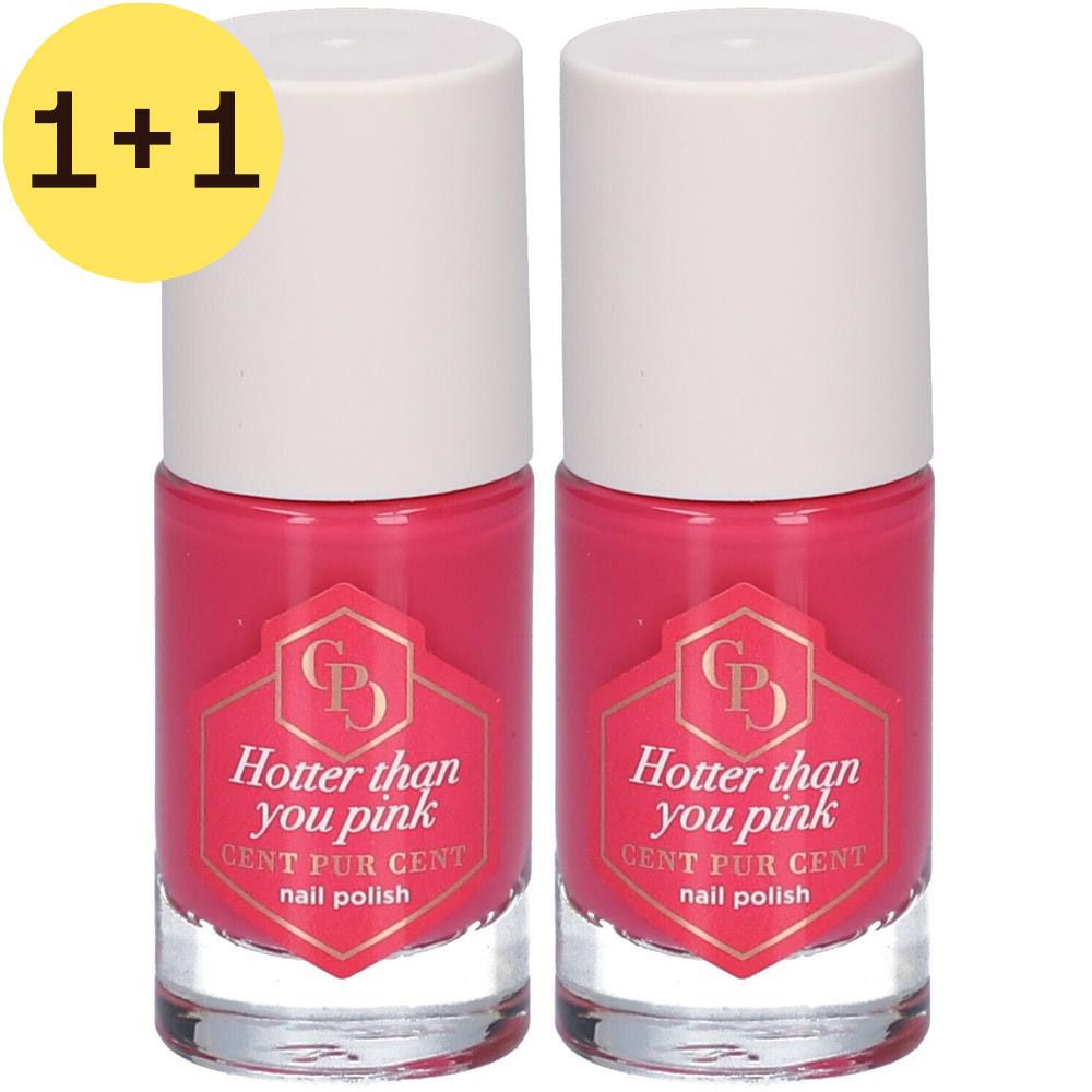Deux flacons de vernis à ongles roses. Inscription : Hotter than you pink, Cent Pur Cent. Bouchon blanc, base transparente.