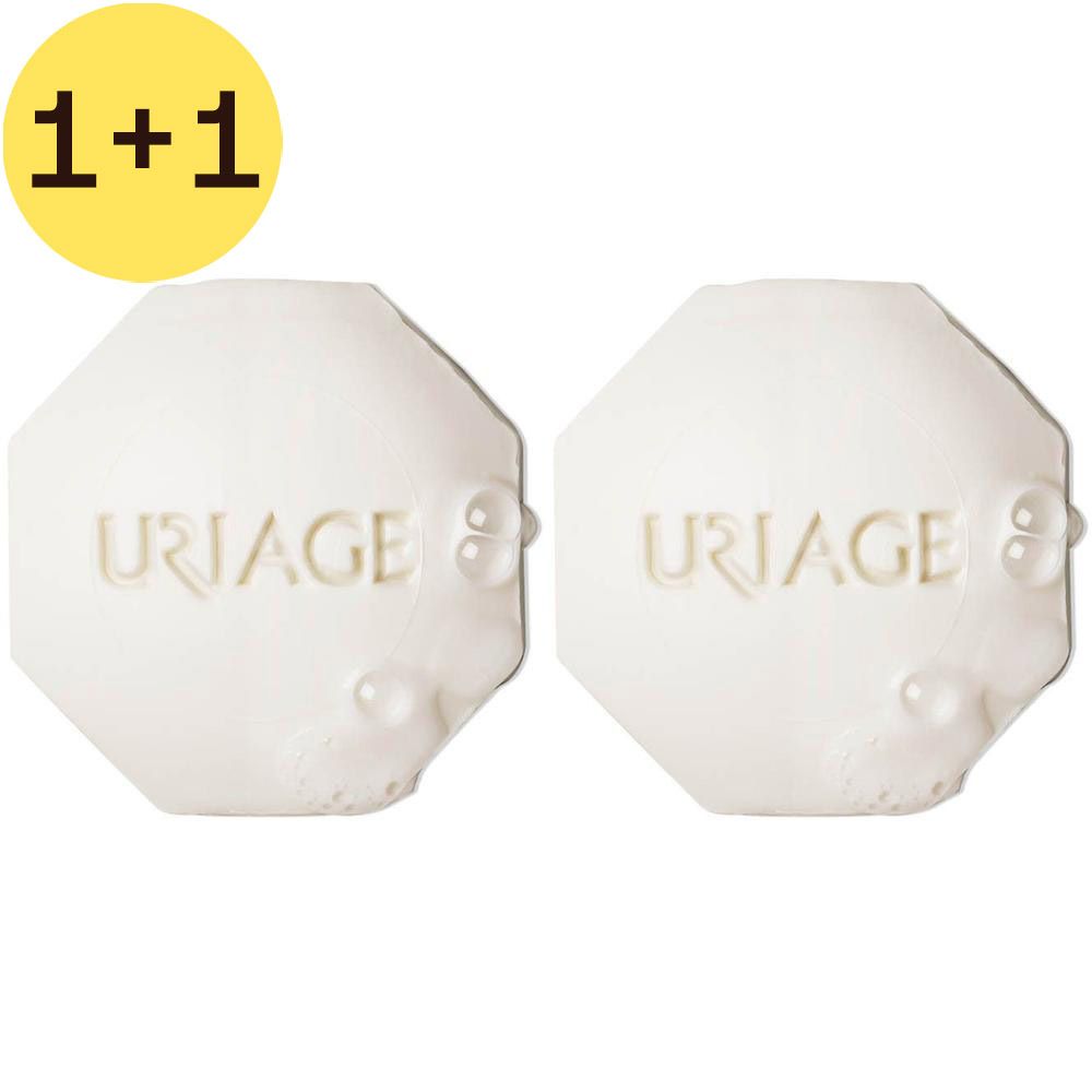 Twee dozen Uriage Pain Surgras Dermatologique. Witte verpakking met productinfo en logo.