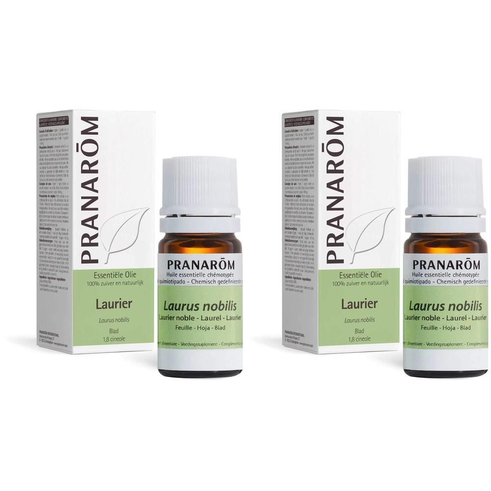 Twee flessen en dozen. Op de dozen staat Pranarôm. Op de flessen staat Laurier noble.