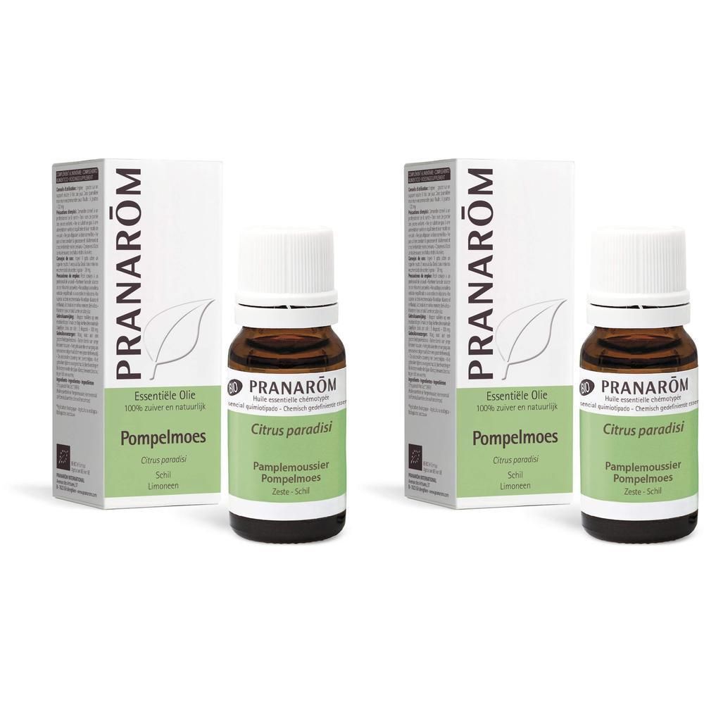 Deux flacons d'huile essentielle avec emballage en carton. Les étiquettes indiquent PRANAROM, Citrus paradisi et Pamplemoussier.