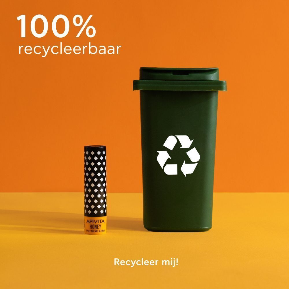 Lippenstift naast een groene vuilnisbak. Tekst: "100% recycleerbaar". 