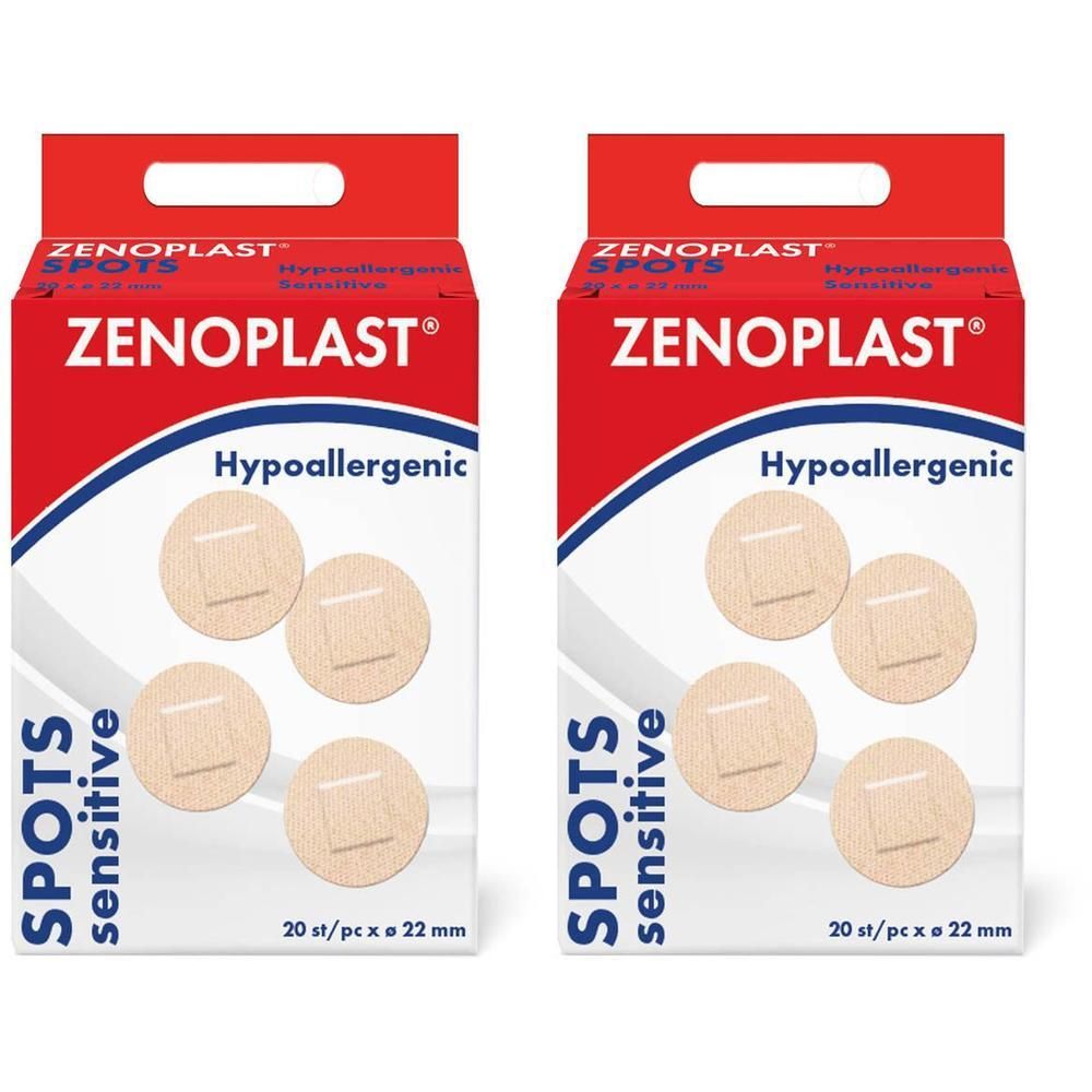 Twee dozen pleisters. Opschrift: ZENOPLAST, SPOTS sensitive, Hypoallergeen. Ronde pleisters zichtbaar.
