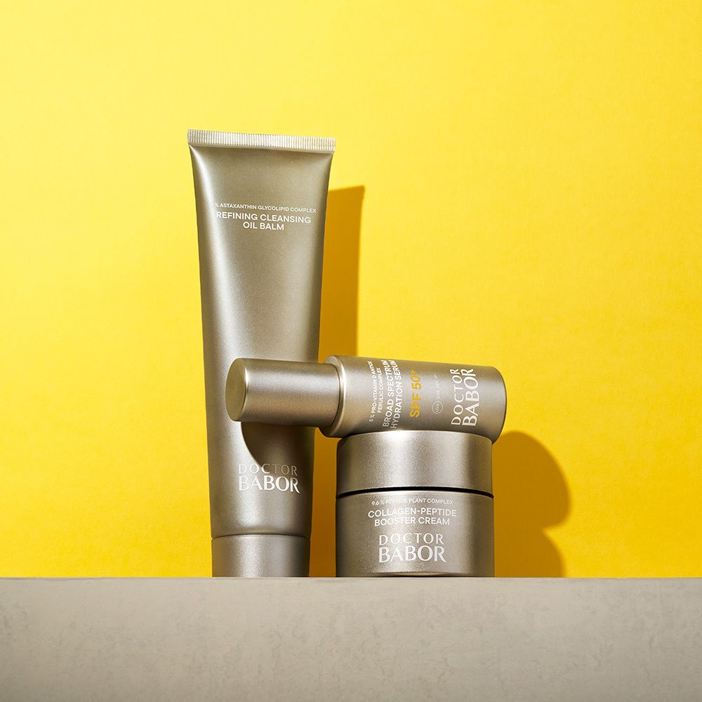 Ensemble de produits, dont tubes, ampoules et emballage jaune. Inscription "DOCTOR BABOR".