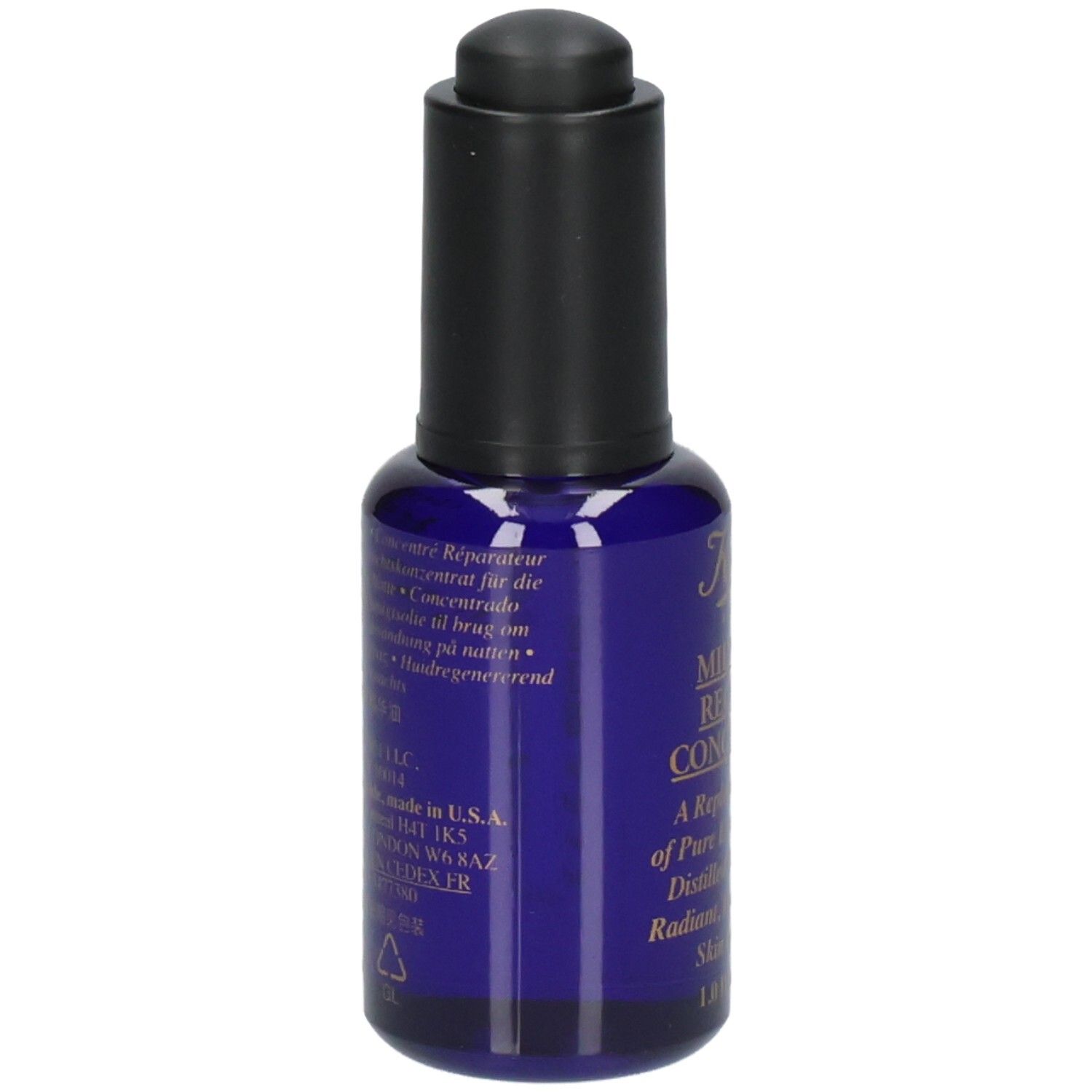 Kiehl's Midnight Recovery Concentrate: Achterkant van de blauwe glazen fles met etiket en informatie.