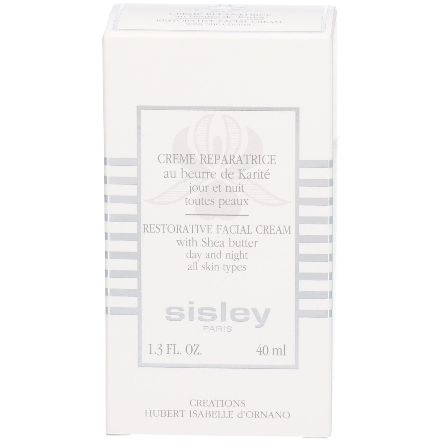 Boîte Sisley Creme Reparatrice. Carton blanc avec lignes argentées et informations produit.