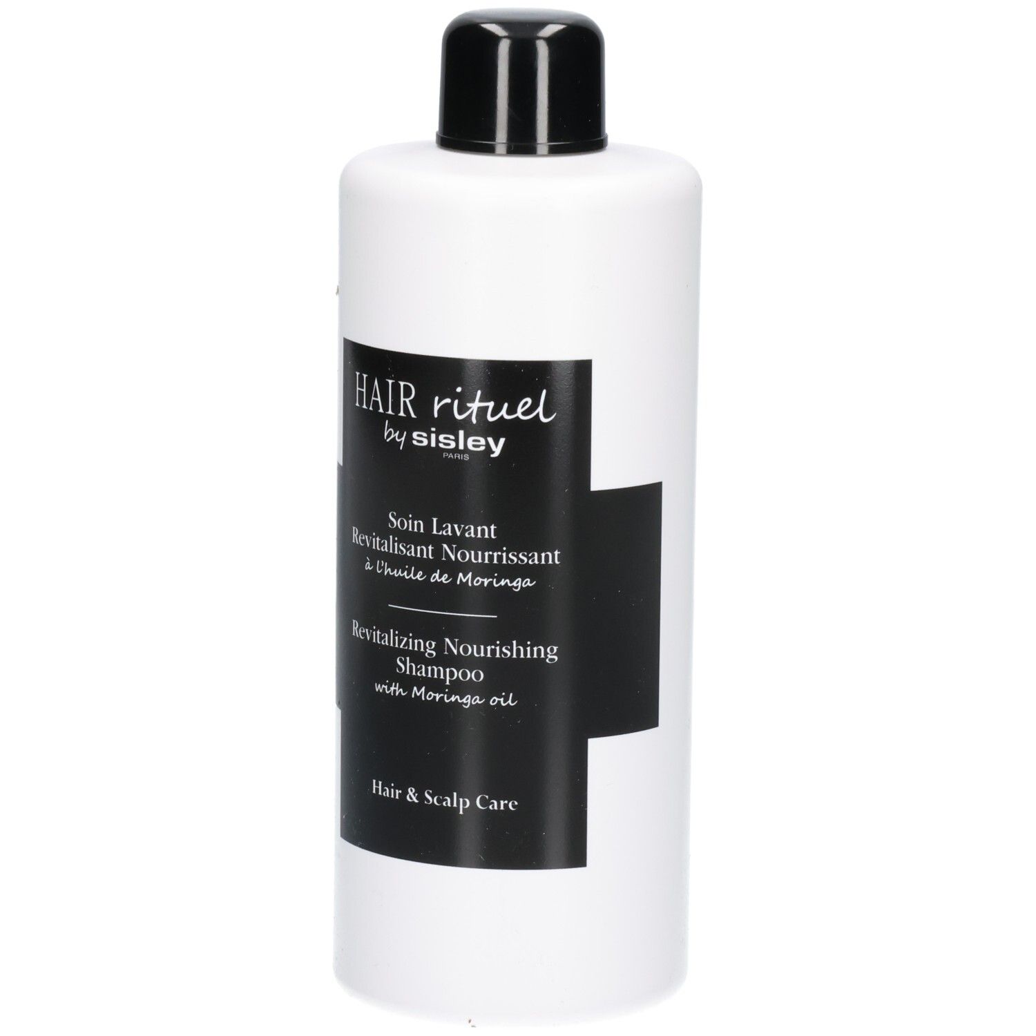 Witte fles met zwart etiket: Revitalizing Nourishing Shampoo.