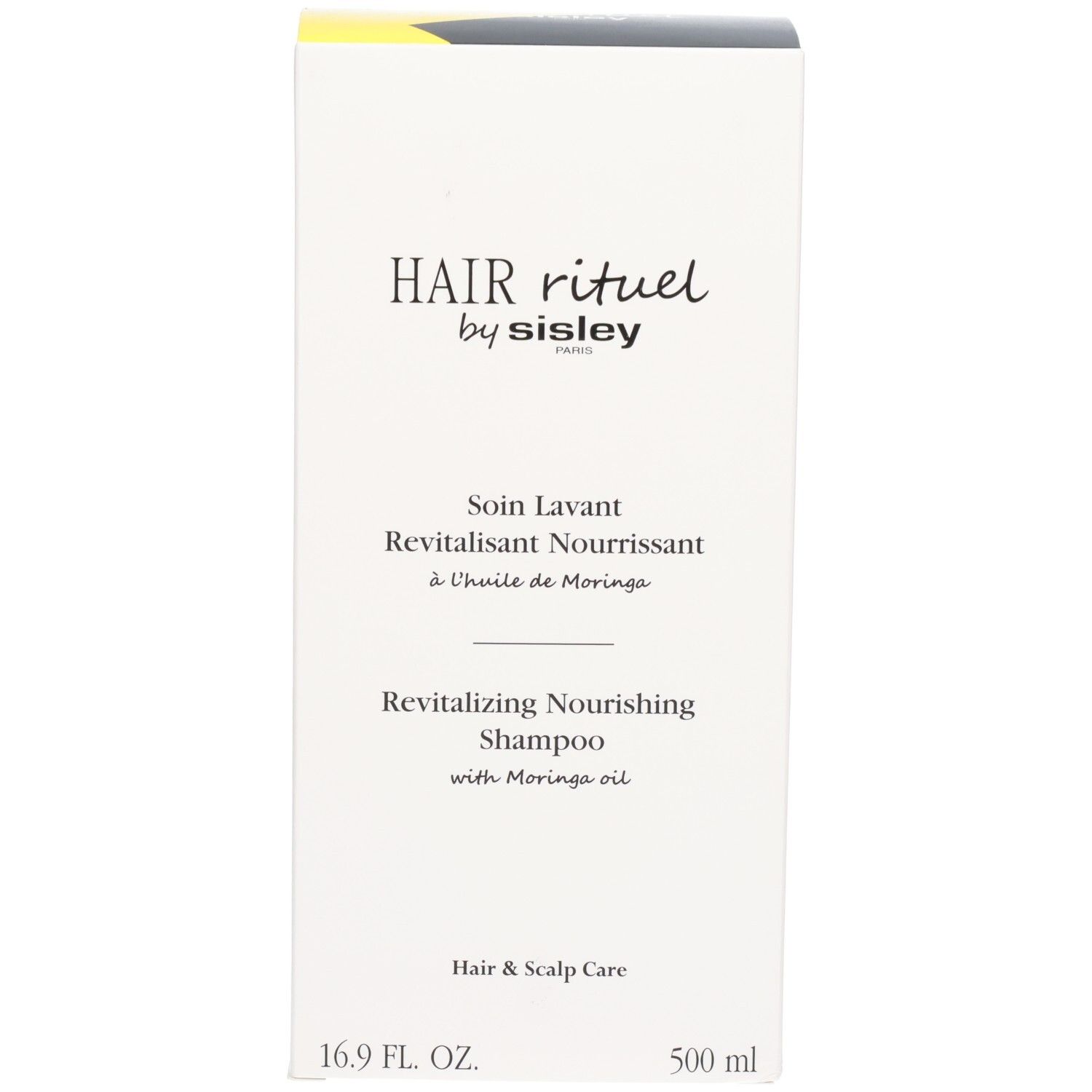 Witte doos met zwart etiket: Revitalizing Nourishing Shampoo, 500 ml.