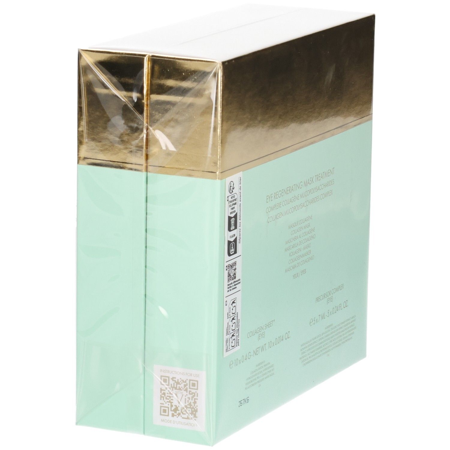 Valmont Oogmasker Behandeling Doos, zijaanzicht met QR-code. Gouden en mintgroene verpakking.